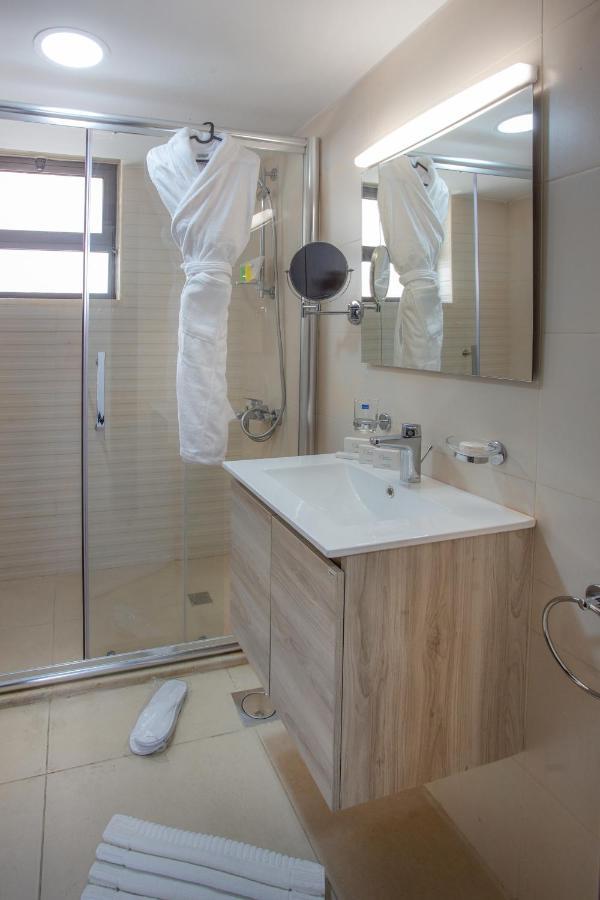 Triple A Hotel Suites Амман Экстерьер фото
